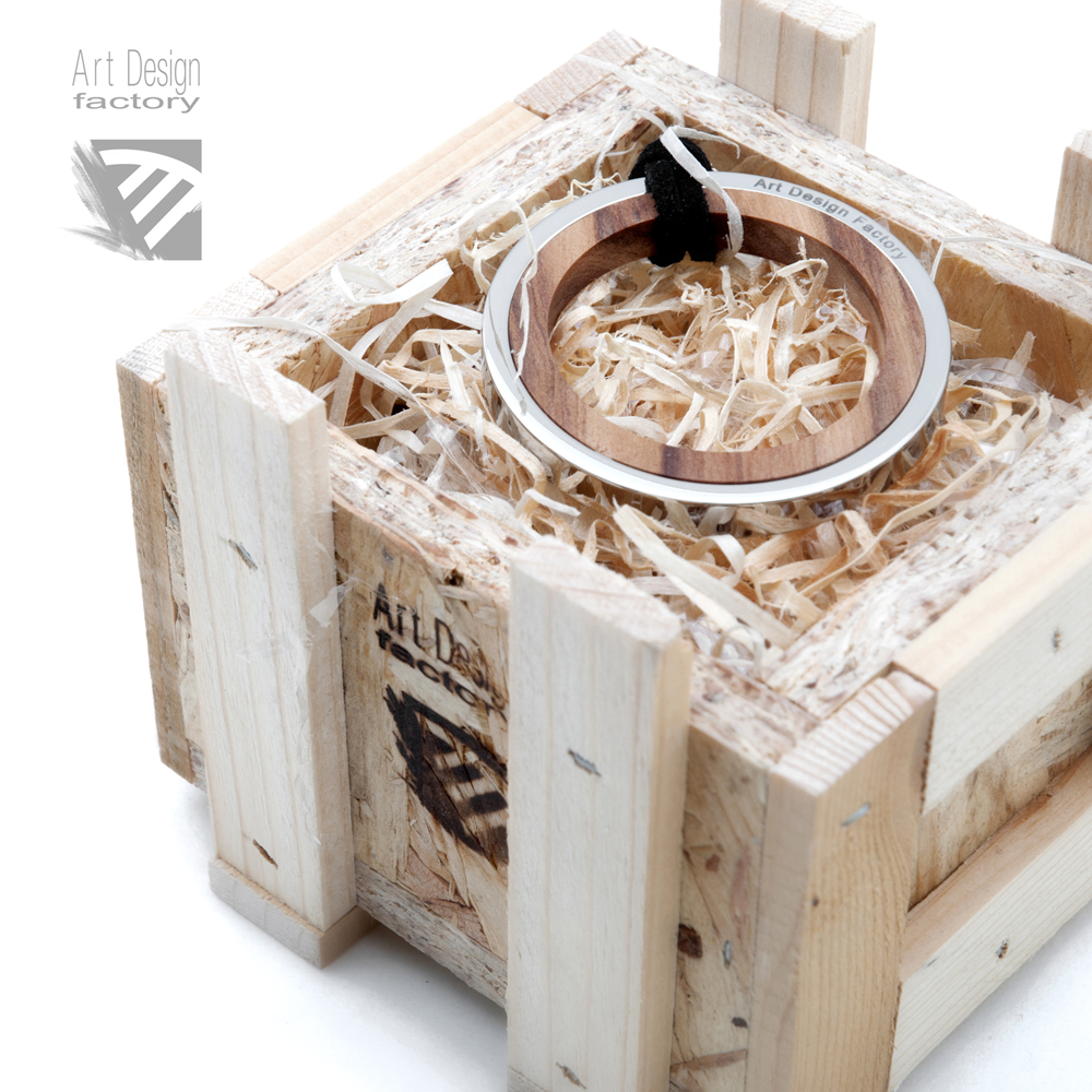 Dual,  pendant made of steel and olive wood 